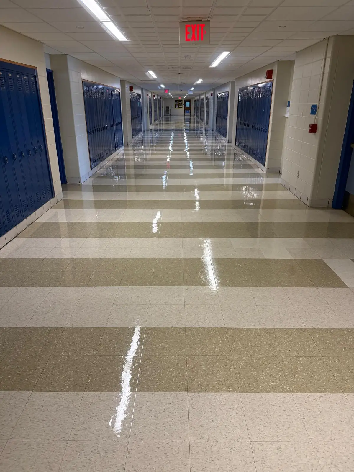 Refinished school locker corridor with two-tone VCT and high gloss finish